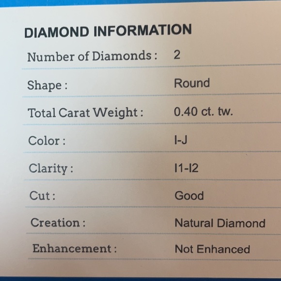 Diamond studs! I-j color in 14 k white gold. .40 cttw - Picture 4 of 4